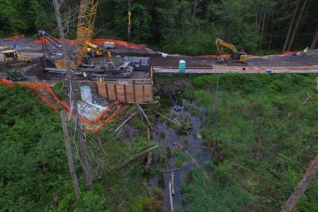 Temporary shoring wall to construct bridge shaft adjacent to sensitive wetland area